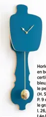  ??  ?? Horloge « Kloq » en bouleau certifié FSC laqué bleu, 179 € le petit modèle (H. 59 x l. 20 xP. 9 cm), 239 € le grand (H. 75,5 x l. 26,2 x P. 10 cm). Léo le Pirate