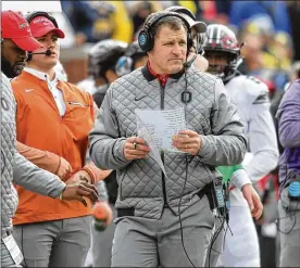  ?? DAVID JABLONSKI / STAFF ?? Greg Schiano soon could be a college head coach or NFL assistant — but he also could end up sharing Ohio State defensive coordinato­r duties.