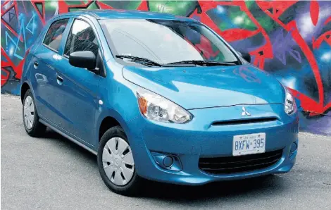  ?? LESLEY WIMBUSH/DRIVING ?? The 2015 Mitsubishi Mirage ES might not be much to look at, but its fuel-economy numbers are worthy of a hybrid.