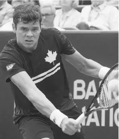  ?? PIERRE OBENDRAUF/ POSTMEDIA NEWS ?? Canada’s Milos Raonic returns a serve from Ernests Gulbis of Latvia in Rogers Cup tennis action in Montreal on Friday.