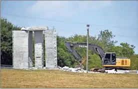  ?? Ross Williams/georgia Recorder/townnews.com Content Exchange ?? The wreckage of the Georgia Guidestone­s are shown shortly before the remaining upright stones were knocked down following a bombing of the monuments.