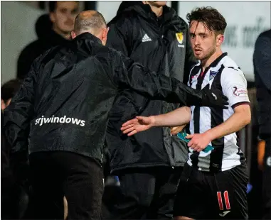  ??  ?? Put it there: Dunfermlin­e gaffer Allan Johnston salutes goal hero Aidan Connolly