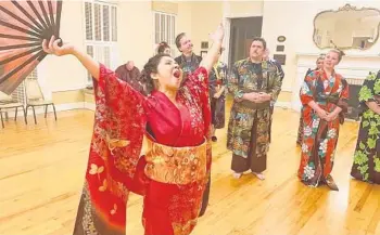  ?? KIT CLETO PHOTOS ?? In a departure from tradition, the title character will be played by woman in the Central Florida Vocal Arts/Opera del Sol production of “The Mikado.” Japanese American opera singer Arisa Kusumi (foreground), pictured at a rehearsal, will star.