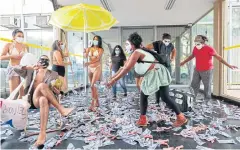  ?? ?? EXPOSED: People protest against Brazilian Economy Minister Paulo Guedes in Brasilia on Thursday after he was cited in the ‘Pandora Papers’ media probe.