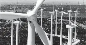  ?? Carolyn Mary Bauman / Fort Worth Star-Telegram ?? Wind turbines, 25 stories tall, rise from the plains in Big Spring. Texas is one of the windiest states, and the Panhandle and West Texas are the state’s windiest regions.