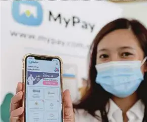  ?? PIC BY ASYRAF HAMZAH ?? Pertama Digital Bhd operates MyPay, a mobile applicatio­n for secure, easy and fast check-and-pay transactio­ns with government agencies.