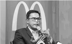 ??  ?? Azmir is seen speaking after McDonald’s Malaysia’s business briefing yesterday.