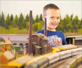  ??  ?? Lucas Wright 6, enjoys a display at the Wanganui Model Railway and Engineerin­g Society open day in June last year. The society will host the bi-annual Wanganui Model Railway Expo, with model railway displays, engineerin­g displays and Lego from all over the North Island on September 28-29.