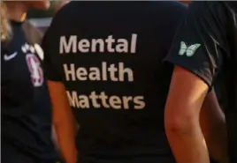  ?? Yalonda M. Jamess/San Francisco Chronicle via AP ?? Stanford women’s soccer players wear warmup jerseys with “Mental Health Matters” on their backs to remember a teammate who died by suicide.