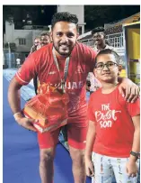  ?? B. JOTHI RAMALINGAM ?? Inspiring the youth: Harmanpree­t poses with a fan. “We want to inspire young people to say, ‘Yes, we want to play too’” — he says.
