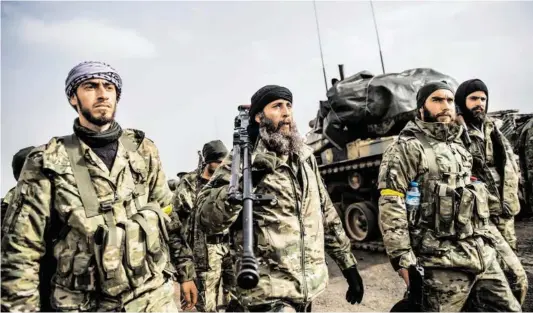  ?? BILD: SN/APA/AFP/BULENT KILIC ?? Türkische Truppen gehen gegen die Kurden in Afrin vor. Diese wiederum will Assad nun stützen.