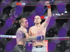  ?? John Locher The Associated Press ?? Nate Diaz celebrates Saturday after defeating Tony Ferguson in a welterweig­ht bout during UFC 279 at T-mobile Arena.