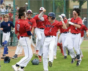  ?? TIM PHILLIS — FOR THE NEWS-HERALD ?? Kenston celebrates during its victory over South in a district final May 26at Euclid.