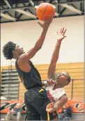  ?? MIKE MANTUCCA/DAILY SOUTHTOWN 2015 ?? Thornwood graduate Chelby Frazier, left, was playing a pickup game of basketball Sunday in Thornton when he reportedly collapsed and died.