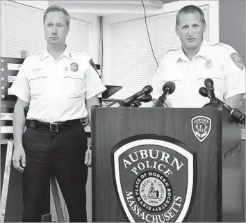  ?? Christine Hochkeppel AP ?? THE AUBURN, MASS., Police Department said three officers had been sent to the hospital for “high carbon-monoxide levels.” Above, Deputy Fire Chief Glenn Johnson, right, and Police Chief Andrew Sluckis.