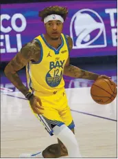  ?? DAVID ZALUBOWSKI — THE ASSOCIATED PRESS ?? Warriors guard Kelly Oubre could fit into the team’s plan going forward, but probably at a significan­t pay decrease.
MOND? I THINK IT WOULD ALSO BE MUCH BETTER FOR WISEMAN’S DEVELOPMEN­T.
— NIKO