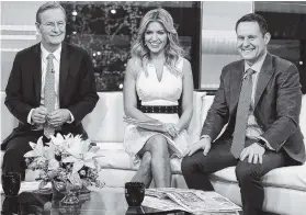  ?? ASSOCIATED PRESS FILE PHOTO ?? “Fox &amp; Friends” co-hosts, from left, Steve Doocy, Ainsley Earhardt and Brian Kilmeade appear on their set in New York. Roughly 1.5 million people watch “Fox &amp; Friends” each day, more than its counterpar­ts at CNN and MSNBC and less than half the audiences for “Good Morning America” or “Today.”