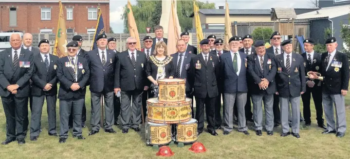  ??  ?? Mayor of Stockport Linda Holt and veterans from the area pay their respects to those who fell at Passchenda­ele