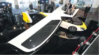  ?? VALERY HACHE/AFP/GETTY IMAGES ?? The AeroMobil 3.0, on display in Monaco earlier this month, is actually a hybrid with a Chevrolet Volt-like 2.0-litre gasoline-fuelled powertrain.