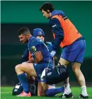  ??  ?? Rob Kearney receives medical attention during Saturday’s game