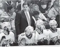  ??  ?? Nashville Predators coach Peter Laviolette, top center, talks to players Friday. The Predators lost 4-1 to the Winnipeg Jets on Friday, and Game 2 is at 7 EDT tonight in Nashville.