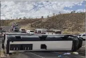  ?? MOHAVE COUNTY SHERIFF’S OFFICE ?? This photo shows a Las Vegas-based tour bus that rolled over in northweste­rn Arizona on Friday. One person died.