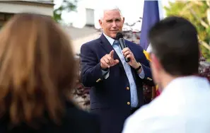  ?? (AP Photo/charlie Neibergall) ?? Former Vice President Mike Pence speaks to local residents May 23 during a meet and greet in Des Moines, Iowa.