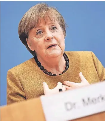 ?? FOTO: MICHAEL KAPPELER/DPA ?? Angela Merkel ist in der Corona-Krise häufig zu Gast im Haus der Bundespres­sekonferen­z.