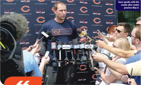  ?? H. Rick Bamman – Shaw Media ?? Gase speaks with the media after rookie
practice May 8.