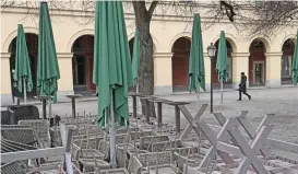  ?? (AFP) ?? Chairs and tables of a closed restaurant have been put away amid the ongoing novel coronaviru­s pandemic in the city of Munich, Germany on April 13