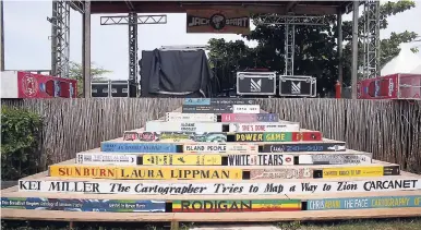  ?? LYEWFREELA­NCE/PHOTOGRAPH­ER STEPHANIE ?? The Calabash performanc­e stage ‘lit up’ with artwork from book spines of popular Caribbean and internatio­nal writers.