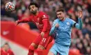  ?? Getty Images ?? Aymeric Laporte challenges Mohamed Salah during Manchester City’s Premier League match at Liverpool this season. Photograph: Robbie Jay Barratt - AMA/