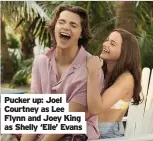  ??  ?? Pucker up: Joel Courtney as Lee Flynn and Joey King as Shelly ‘Elle’ Evans