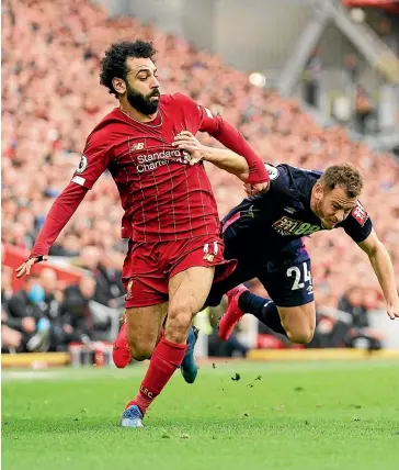  ?? AP ?? Champions-elect Liverpool and Mohamed Salah may yet get a chance to complete their English Premier League season.