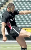  ?? IAN KUCERAK/ POSTMEDIA ?? Canada's Tyler Ardron kicks the ball during practice with the senior men's rugby squad at Commonweal­th Stadium in Edmonton, Alberta on Thursday, June 15, 2017.