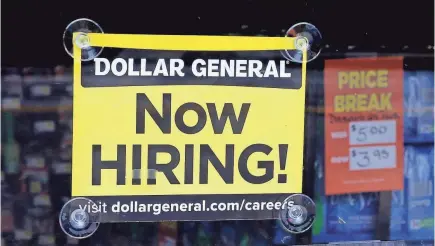  ??  ?? Payroll processor ADP says businesses added 250,000 jobs in December. The Labor Department’s official tally for the month is out Friday. CHARLES KRUPA/AP