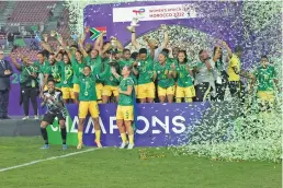  ?? Images /Gallo ?? South Africa’s players celebrate after winning the 2022 Women’s Africa Cup of Nations final against Morocco at Prince Moulay Abdellah Stadium on July 23 in Rabat, Morocco.