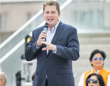  ?? ERNEST DOROSZUK / POSTMEDIA NEWS ?? Conservati­ve Leader Andrew Scheer addresses the crowd at the start of the India Day Festival and Grand Parade in Toronto on Sunday.