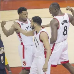 ?? MARK BLINCH / THE CANADIAN PRESS ?? Raptors’ Kyle Lowry, left, Bismack Biyombo and Cory Joseph made an impact in various ways in Toronto’s Game 2 victory over the Pacers.