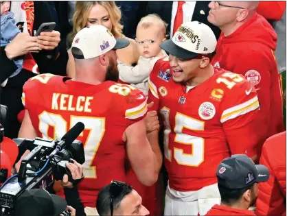  ?? DAVID BECKER — THE ASSOCIATED PRESS ?? Kansas City Chiefs quarterbac­k Patrick Mahomes, right, and tight end Travis Kelce celebrate their overtime win in Super Bowl 58Sunday.