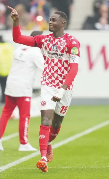  ?? Reuters ?? Mainz’s Moussa Niakhate celebrates after a goal against Bayern during their German League match.