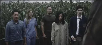  ?? LIONSGATE ?? Tyler (Theo Rossi), Sam (Jordan Claire Robbins), Ryan (Shane West), Denise (Elena Juatco) and Ethan (Julian Feder) in are lost in the corn in ‘Escape The Field.’