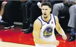  ?? BOB LEVEY/GETTY IMAGES ?? Klay Thompson is just one of three elite scorers on the Golden State Warriors, who also boast a much more talented supporting cast than the one surroundin­g LeBron James in Cleveland.