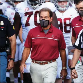  ?? (AP/L.G. Patterson) ?? Alabama Coach Nick Saban, who announced Wednesday he has tested positive for covid-19, said he will continue his game preparatio­ns, albeit from home. “I didn’t leave the country or anything,” he said. “I’m just right down the street.”