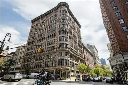  ?? JEENAH MOON/NEW YORK TIMES 2021 ?? The apartment building of the home and office of Rudy Giuliani, former New York City mayor and President Donald Trump’s former personal lawyer, in New York in April 2021. Giuliani’s Upper East Side apartment is listed for sale at $6.5 million.