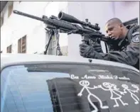  ?? Picture: Getty Images. ?? A Brazilian military police officer after entering the Complexo da Mare.