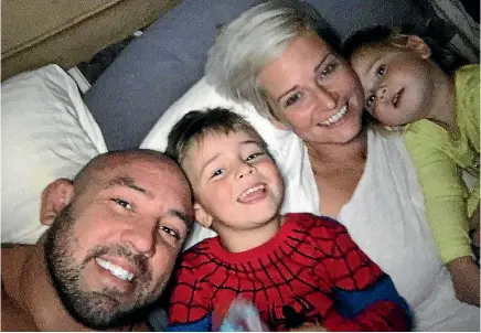  ??  ?? Orlando Sanchez with Trisha, Orlando Jnr and Penelope. The MMA star is headed to New Zealand, and is encouragin­g Kiwi men to open up about their emotional issues.