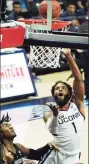  ?? David Butler II / USA TODAY ?? UConn guard R.J. Cole (1) shoots against the Providence Friars in the first half at Harry A. Gampel Pavilion on Tuesday.