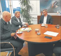  ?? CEDOC PERFIL ?? TANDEM. Frigerio (centro), con Larreta y Peña, en negociacio­nes.