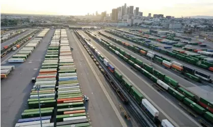  ?? ?? In an aerial view, shipping containers and rail cars sit in a Union Pacific Intermodal Terminal rail yard in Los Angeles, California. Photograph: Mario Tama/Getty Images